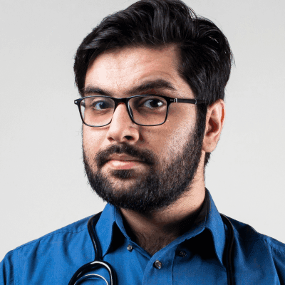 man in blue dress shirt wearing black framed eyeglasses