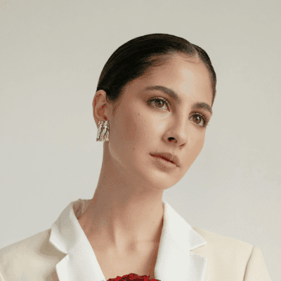 woman wearing white blazer