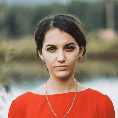 woman standing in front of body water