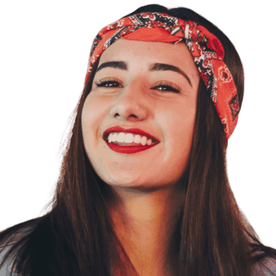 selective focus photography of smiling woman wearing red and black bandana