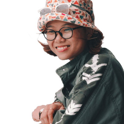 woman wearing green jacket and bucket hat