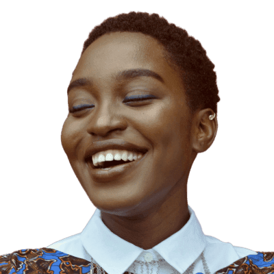 woman smiling beside red wall